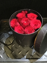 Beautiful black marble hat box with 6 ruby red roses